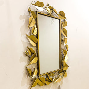 Mirror in metal Leaf frame.